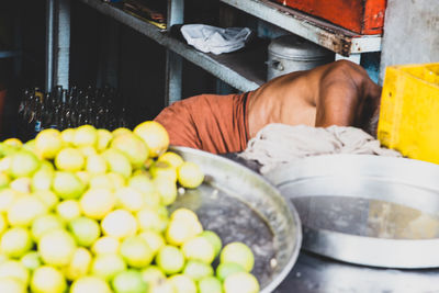 Man preparing food in market