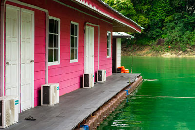 House by swimming pool against building