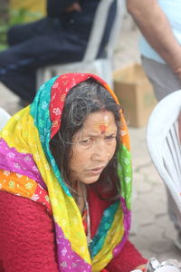 Close-up of thoughtful woman wearing sari looking away