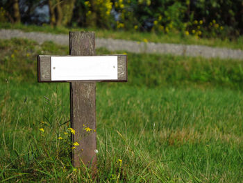 Close-up of cross on field