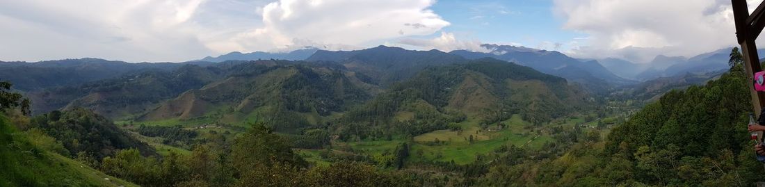 Panoramic view of landscape and mountains against sky