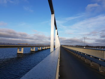 Bridge over sea against sky