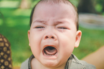 Close-up portrait of cute baby boy