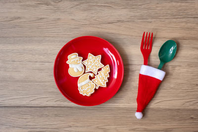 High angle view of tomatoes in plate on table