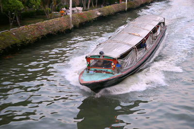 High angle view of boat sailing in sea