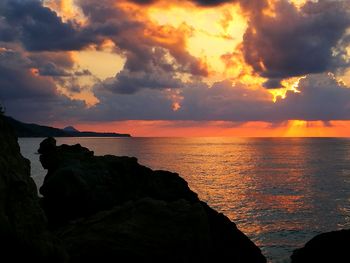 Scenic view of sea against sky during sunset