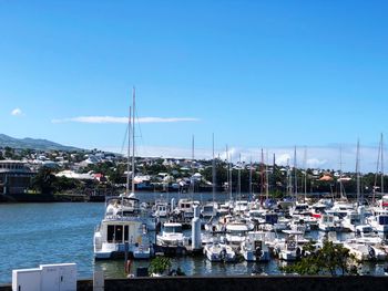 Boats moored in harbor