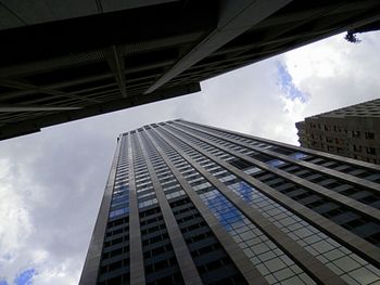 Low angle view of modern building against sky