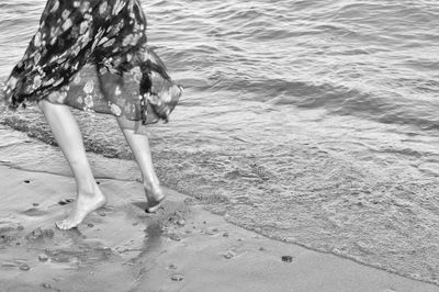 Low section of woman on beach