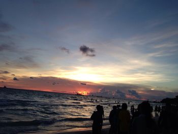 Scenic view of sea at sunset