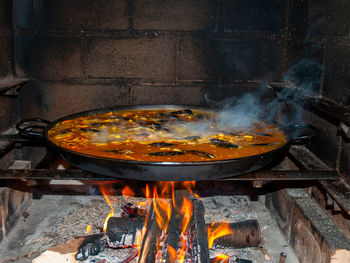 High angle view of bonfire on barbecue grill