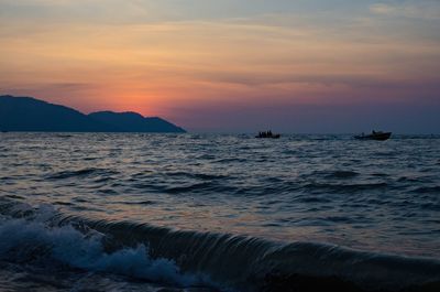 Scenic view of sea against sky during sunset