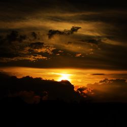 Scenic view of dramatic sky during sunset