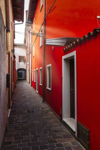Empty alley amidst buildings