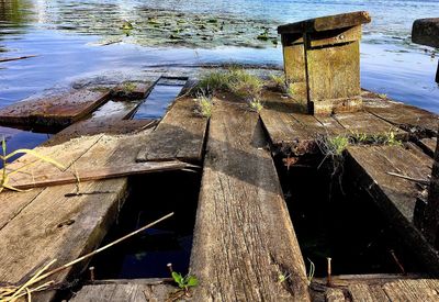 Wooden posts in lake