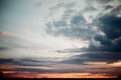 Low angle view of dramatic sky during sunset