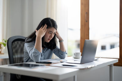 Businesswoman working at office