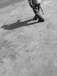 Low section of man standing on floor