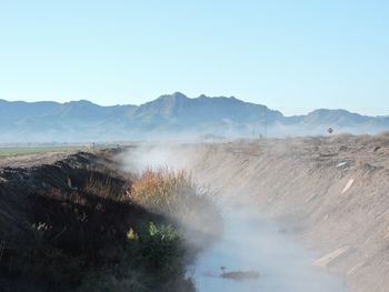 Scenic view of landscape against clear sky