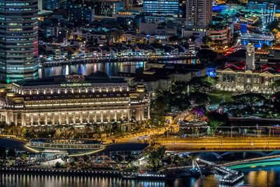 High angle view of illuminated buildings at night