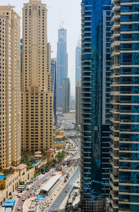 Modern buildings in city against sky