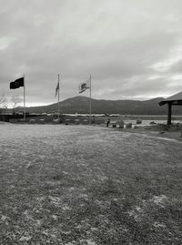 Scenic view of landscape against cloudy sky