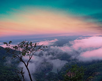 Scenic view of mountains against sky during sunset