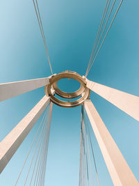 Low angle view of metallic structure against clear sky