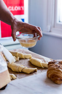 Midsection of person preparing food