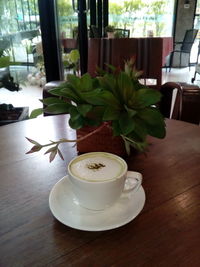 Close-up of coffee cup on table