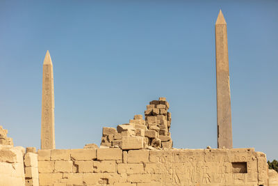 Different hieroglyphs on the walls and columns in the karnak temple.