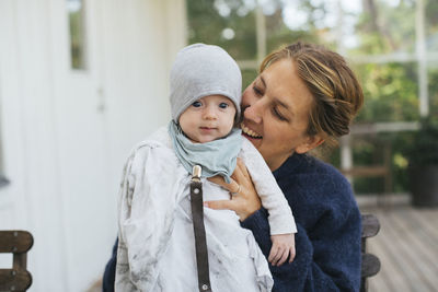 Portrait of mother and daughter outdoors