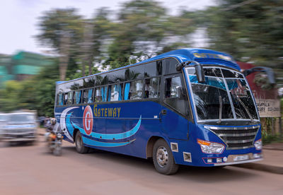 View of car on road against blue sky