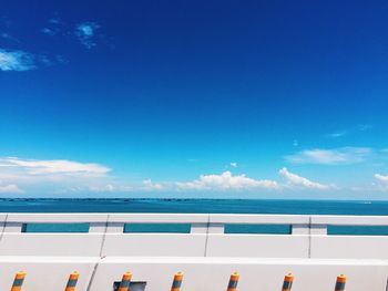 Scenic view of sea against blue sky