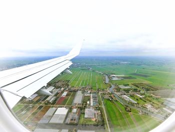 Aerial view of city against sky