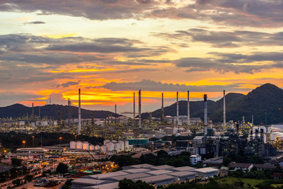 High angle view of buildings against sky during sunset