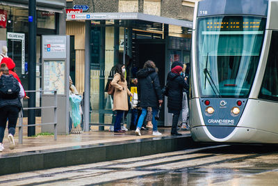 People on street in city