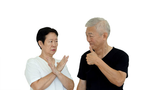 Man standing against white background