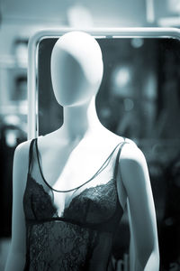 Lingerie displayed on mannequin in store