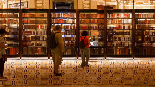 People waiting for sale in library