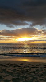 Scenic view of sea at sunset