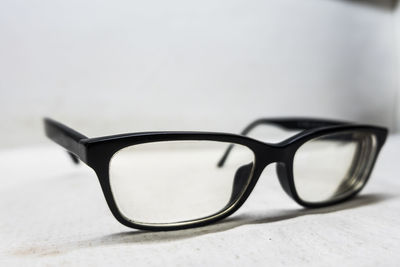 Close-up of eyeglasses on table