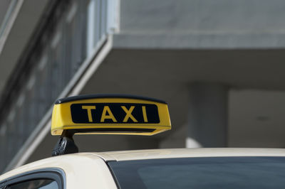 Close-up of text on taxi
