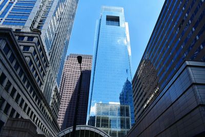 Modern skyscrapers against blue sky