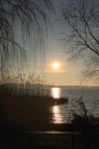 Scenic view of sea against sky at sunset