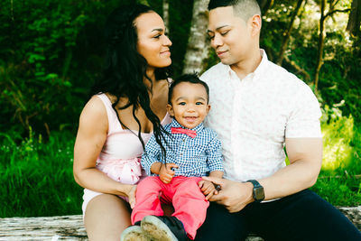 Closeup cropped family portrait of two parents and their baby boy