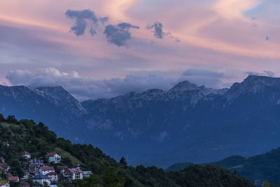 Scenic view of mountains against sky during sunset