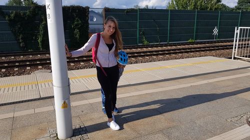 Full length of woman on railing