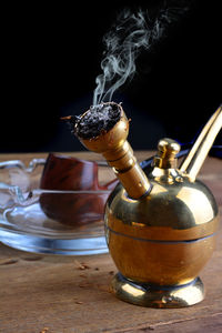 Close-up of drink served on table