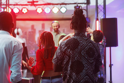 Rear view of people at music concert